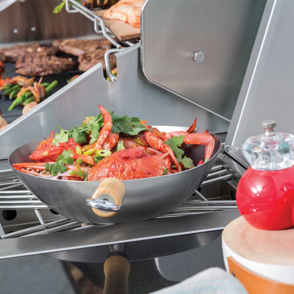 Bbq with wok outlet burner